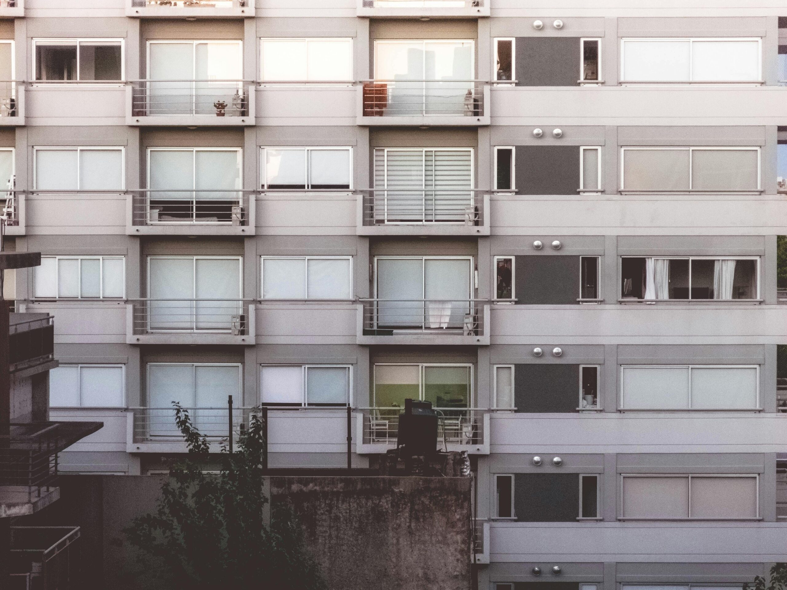Modern apartment building facade in San Nicolas, showcasing urban architecture.